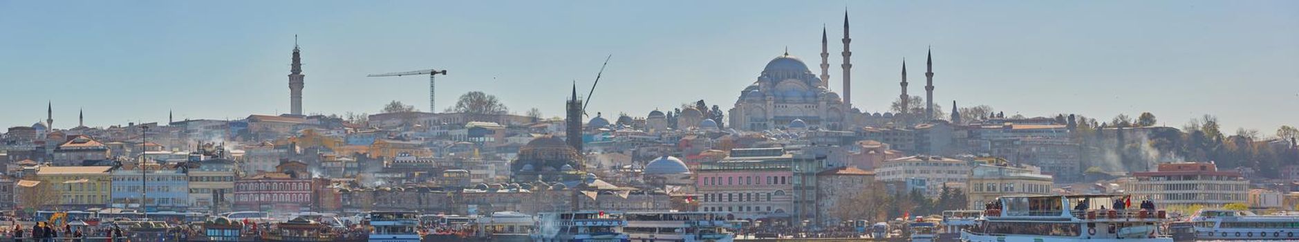 Istanbul, Turkey - 1 April, 2017: Panorama of Cityscape of Golden horn with ancient and modern buildings.