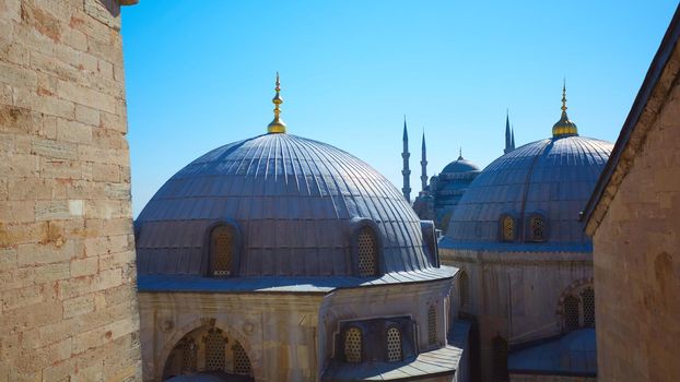 Blue mosque with Domes of the Hagia Sophia in the foreground, Istanbul, Turkey.