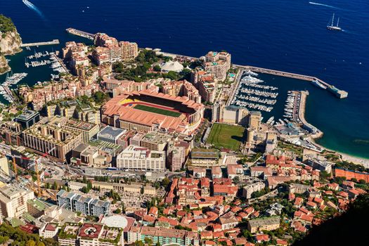 Aerial view of port Cap Dail at sunset, France, a lot of boats are moored in marina, view of city life from La Turbie mountain, mega yachts. High quality photo