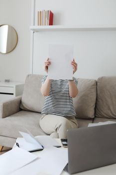 office manager or freelancer in a stylish room. Confident business woman working at workplace in a modern office. Office manager or freelancer work