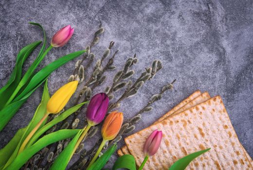Jewish Passover holiday Pesach celebration with flowers matzah unleavened bread,