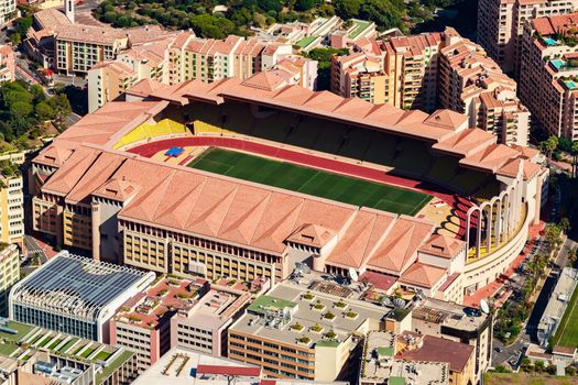 Aerial view of stadium of Monaco at sunset, view from mountain La Turbie, landmark of Monte-Carlo, port Cap Dail, port Fontvieille, Monaco Ville. High quality photo