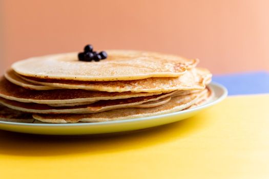 stack of delicious pancakes on a white background, closeup