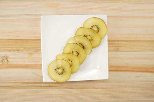 Kiwi fruits arranged in the plate. Shooting Location: Yokohama-city kanagawa prefecture