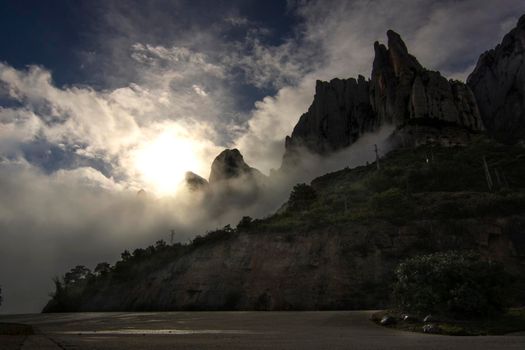 Montserrat mountain covered by clouds view from the road