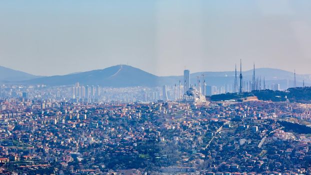 Asian part of Istanbul, the Uskudar shore, the aerial view. Shooting through the glass. Retro style