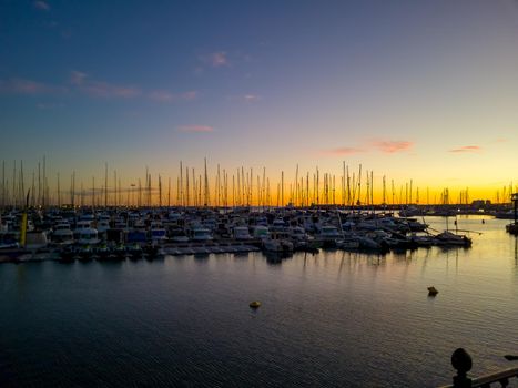 The Mediterranean Sea. Sea marina for yachts in the evening, the sun sets.