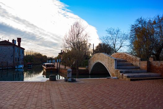 View of the bricks Bridge on the island of Torcello, Venice. Italy