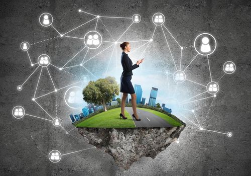 Elegant businesswoman on flying green island against concrete background