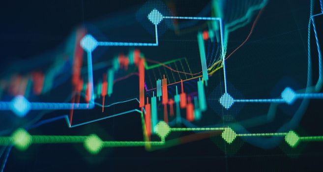 Abstract financial graph with candle stick and bar chart of stock market on financialbackground