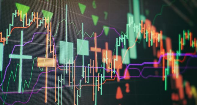 Businessman hand working on analyzing investment charts for Gold market, Market and Trading market.