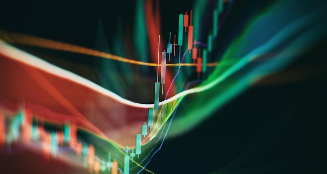 Businessman hand working on analyzing investment charts for Gold market, Forex market and Trading market.