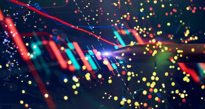 Price chart and pen indicator on screen, red and green candlestick chart on blue screen theme, market volatility, uptrend and downtrend.