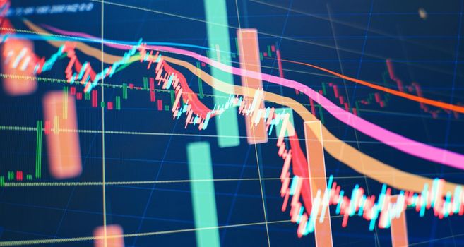 Concept of stock market and fintech.Abstract financial trading graphs on monitor.