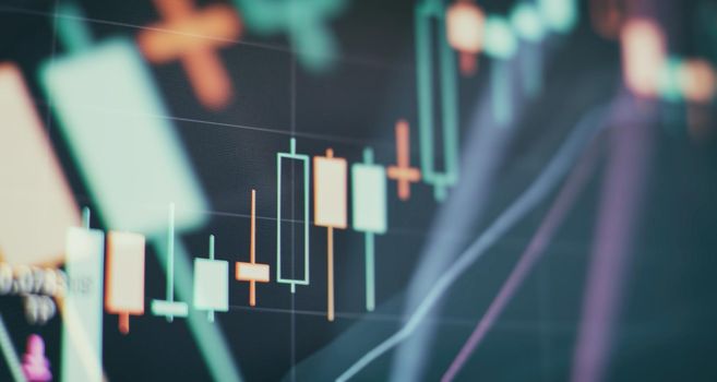 Blurry growing digital graph interface over dark blue background. Concept of stock market and financial