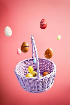 Easter eggs falling into a flying basket, Easter holiday concert