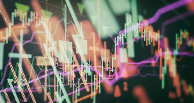 Businessman hand working on analyzing investment charts for Gold market, Market and Trading market.