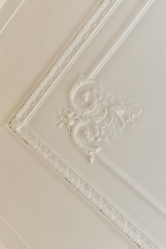 A pattern made on the white ceiling of a modern residential building
