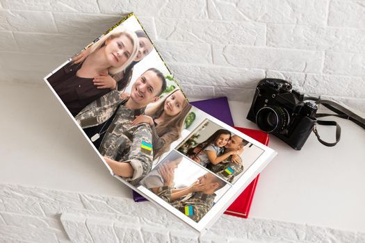 military family photo book with ukraine flag.