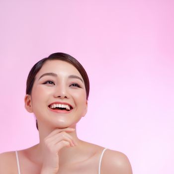 Portrait of beautiful young woman on color background
