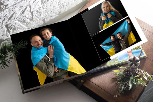 military family photo book with ukraine flag.