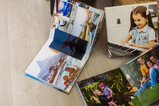 photo books near the christmas tree as a gift.