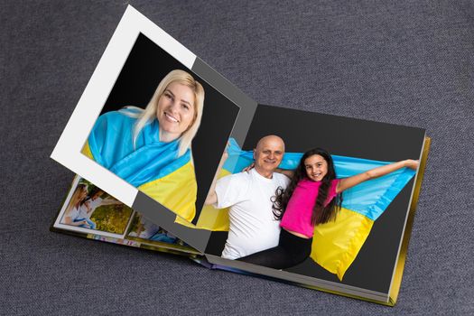 military family photo book with ukraine flag.