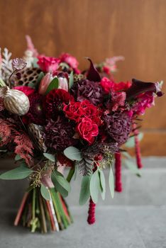 elegant wedding bouquet of fresh natural flowers and greenery