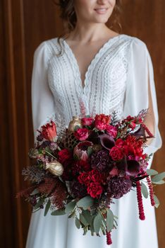 elegant wedding bouquet of fresh natural flowers and greenery