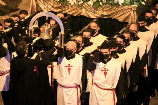 Elche, Spain- April 12, 2022: Bearers of the Brotherhood Procession of Virgin Mary Mater Desolata in Holy Week in Elche