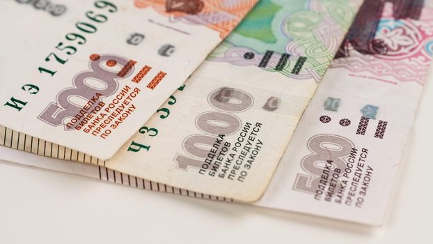 Close-up of banknotes. Five thousand, one thousand, five hundred rubles