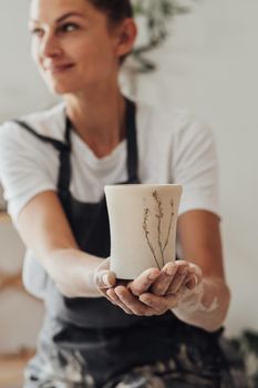 Female Ceramist Artist Holding in Hand Handmade Crafted Cup