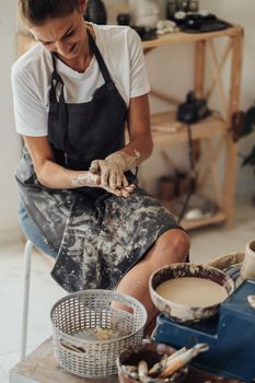 Female Pottery Master at Work in Her Clay Studio, Young Entrepreneur Woman Happy Owner of Small Business