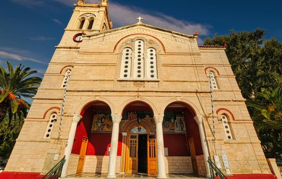 Wonderful orthodox church at the port of Aegina island, sunny weather