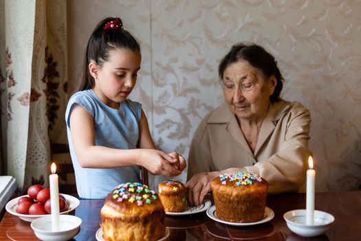 Easter. Very old grandmother and granddaughter.