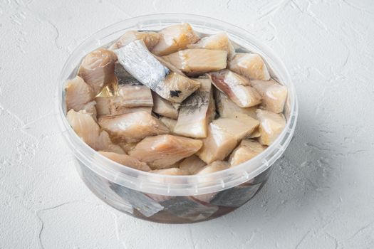 Herring fillet in oil, on white background