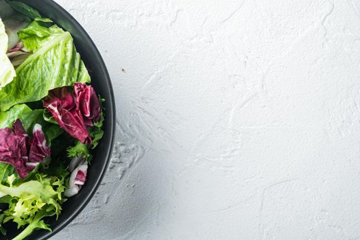 Frieze, romaine and Radicchio lettuce salad, on white background, top view flat lay with copy space for text
