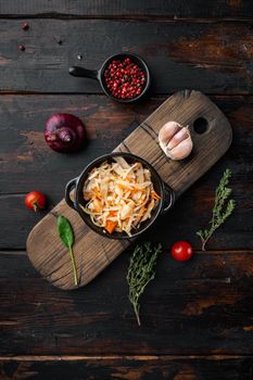 Cabbage preserving set, on old dark wooden table background, top view flat lay