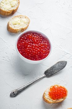 Canape with Red Salmon Caviar, for New Year, on white background