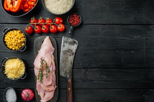 Chicken Enchilada ingredients Rice, mozzarella, corn, on black wooden table background, top view flat lay with copy space for text