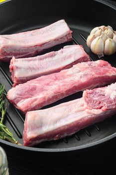 Raw ribs with a rosemary and vegetablesset