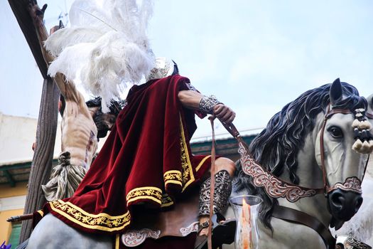 Elche, Spain- April 13, 2022: Easter Parade with bearers and penitents through the streets of Elche city in the Holy Week