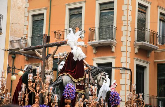 Elche, Spain- April 13, 2022: Easter Parade with bearers and penitents through the streets of Elche city in the Holy Week