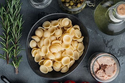 Tuna pasta cooking ingredient, on gray background