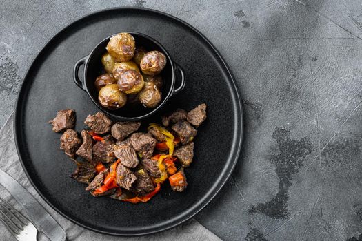 Bangin beef stew served, on gray stone background, top view flat lay, with copy space for text