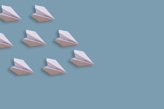 Set of paper planes. Isolated on a blue background.