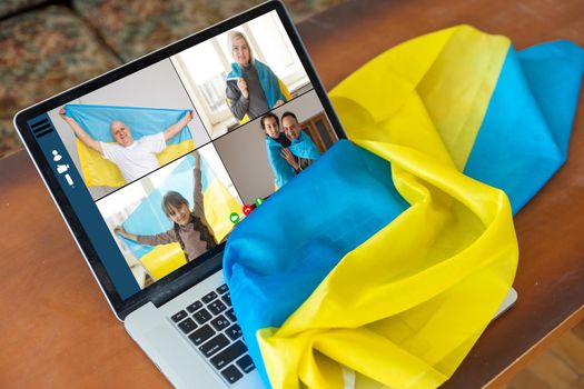 flag of ukraine, young woman teacher working with laptop sitting in classroom. Education, school college university.