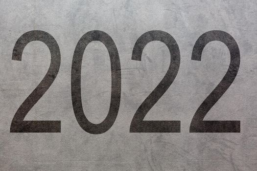 The year 2022 written in vintage background.