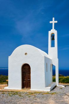 Greek traditional white washed orthodox curch. Crete island, Greece