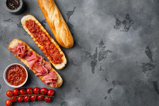 Healthy breakfast with homemade bread toast set, on gray stone table background, top view flat lay, with copy space for text